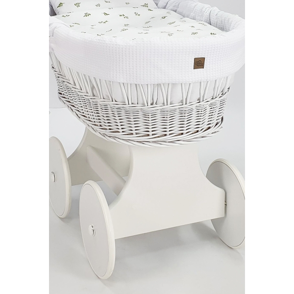 Culla in vimini con base in legno bianco