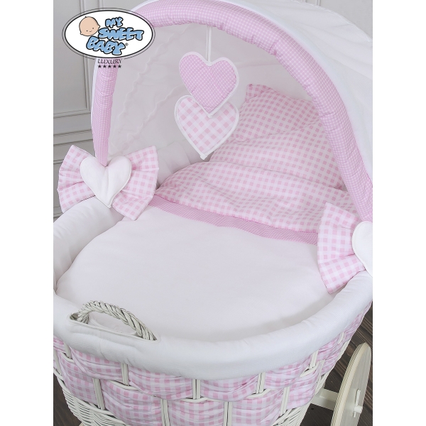 Culla neonato con biancheria colore tessile bianco e rosa