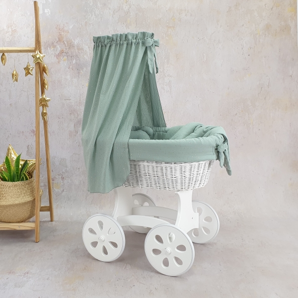 Piccola culla vimini neonato con velo